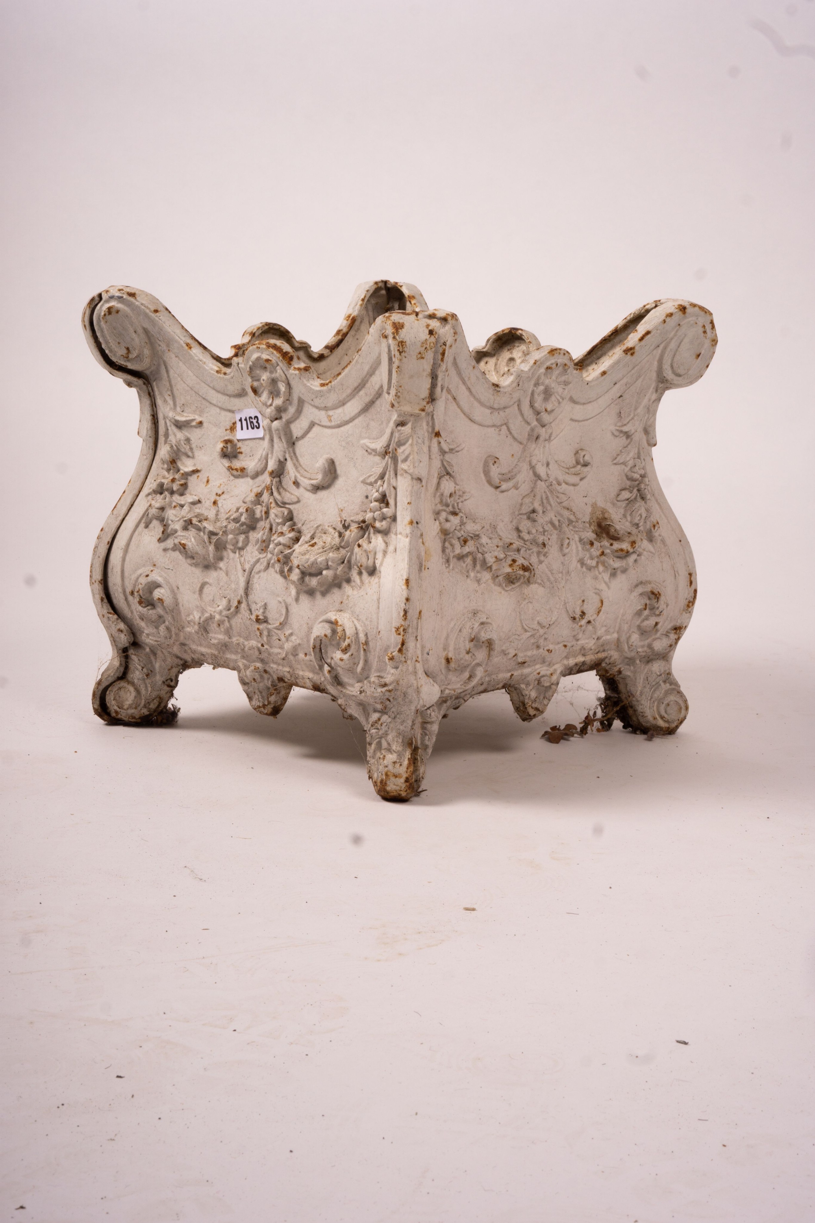 A Victorian style square cast iron jardiniere, width 38cm, height 34cm